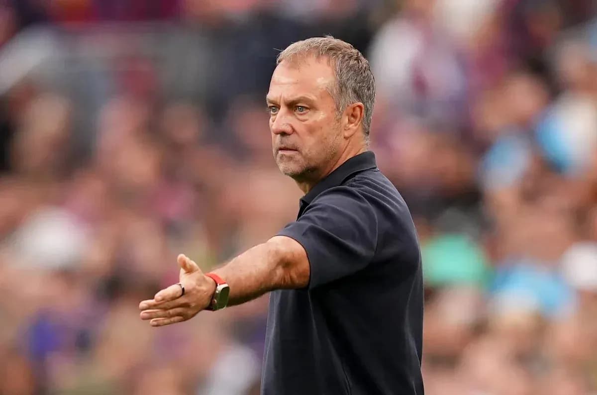 Coach gesturing during a match on the sideline