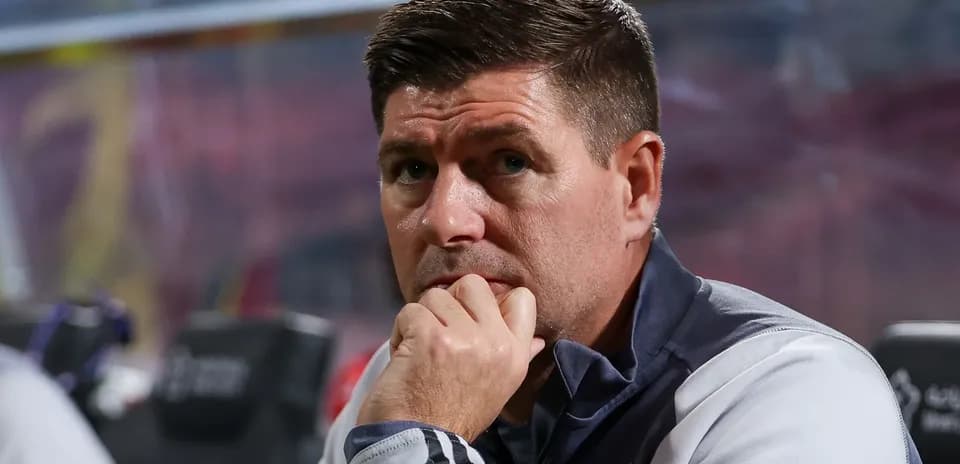 Coach observing the game from the sidelines