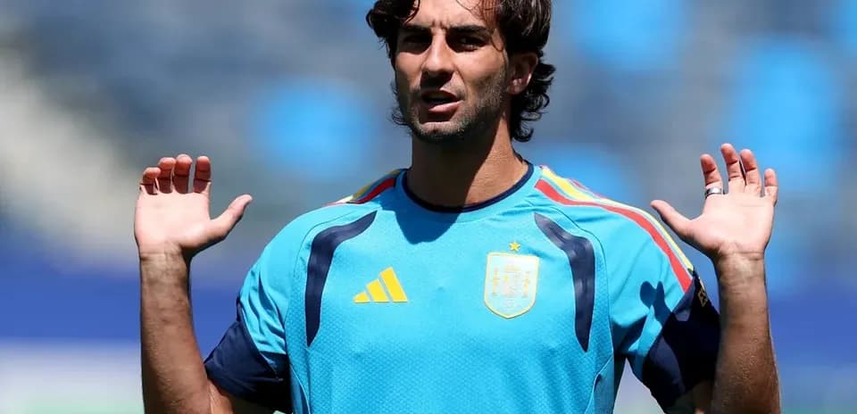 Player gesturing during training session in team jersey