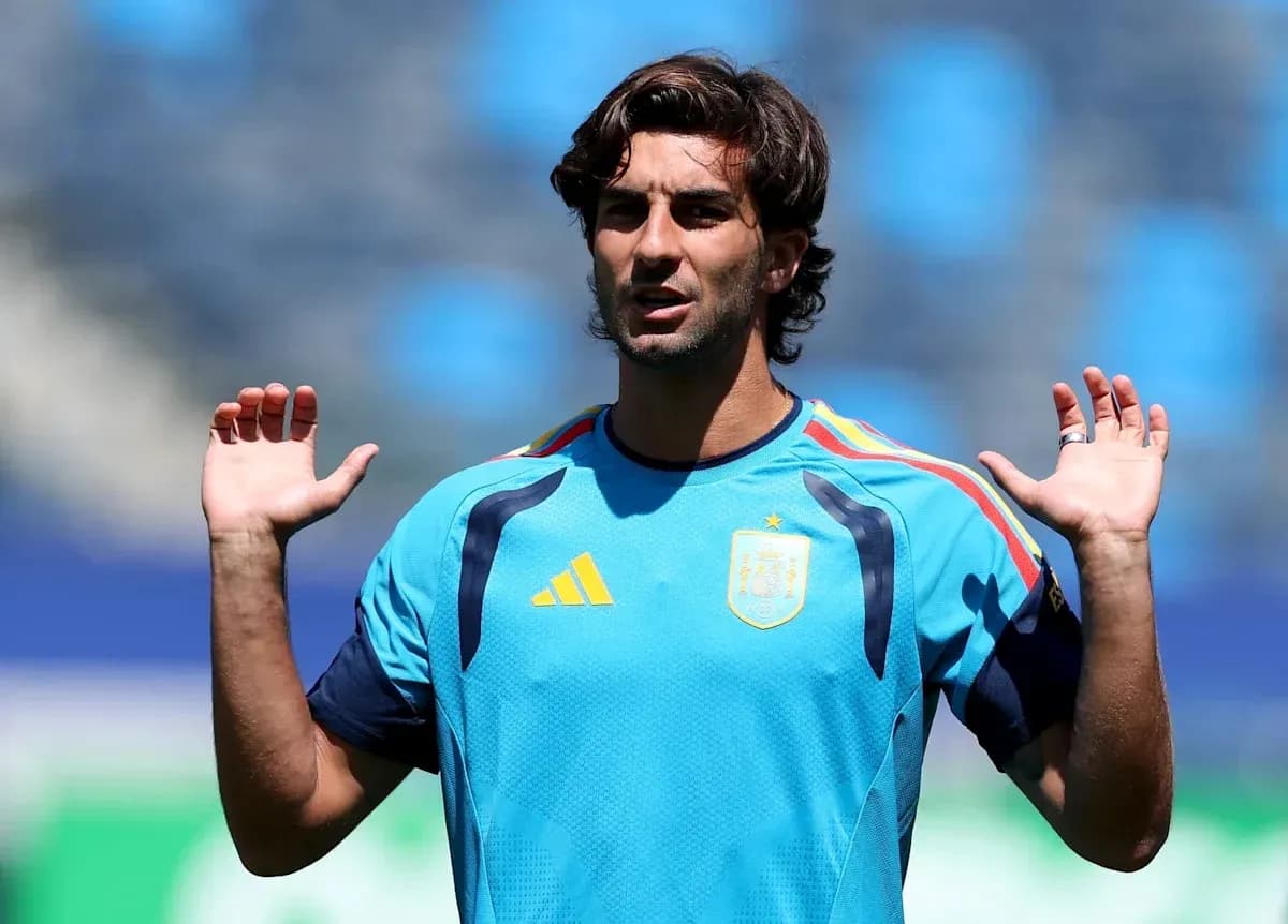 Player gesturing during training session in team jersey