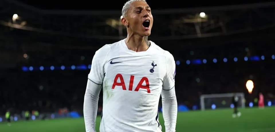 Player celebrating in Tottenham kit after scoring