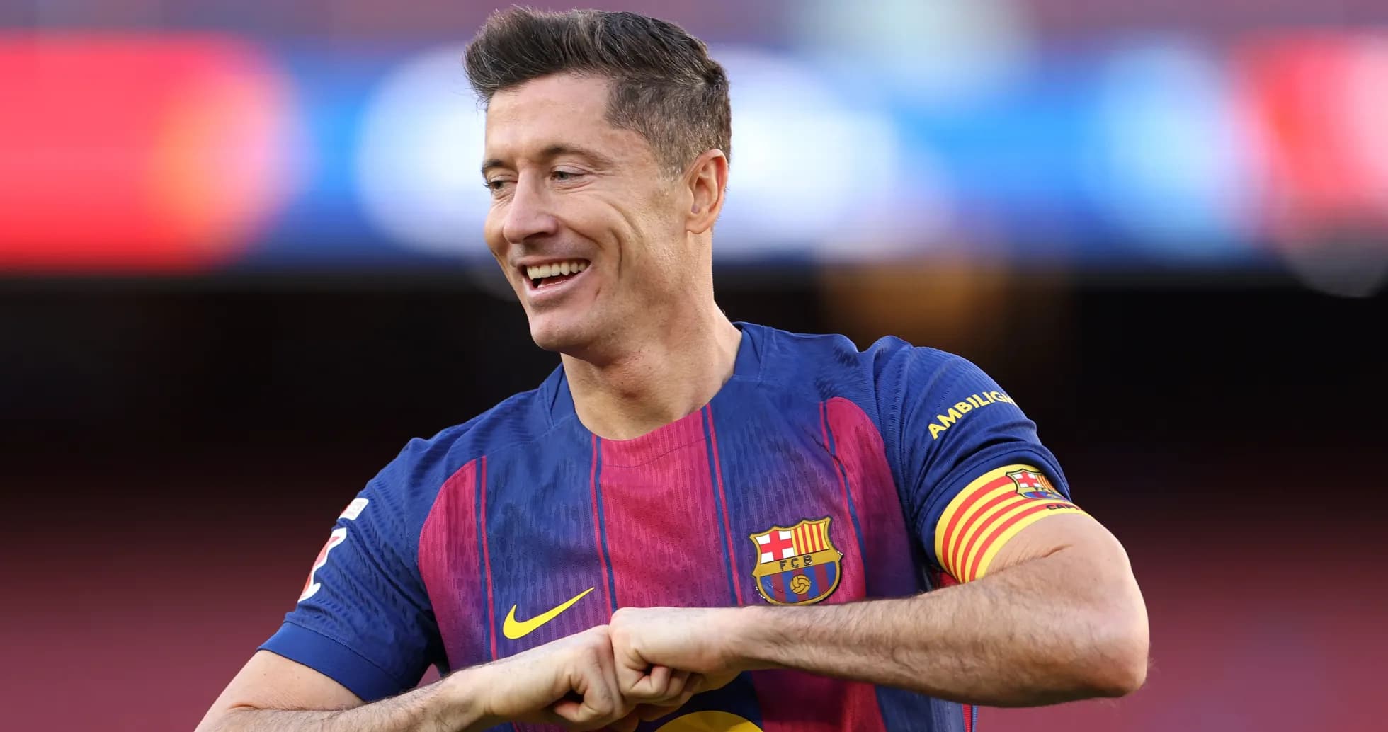 Player celebrating in Barcelona jersey on pitch