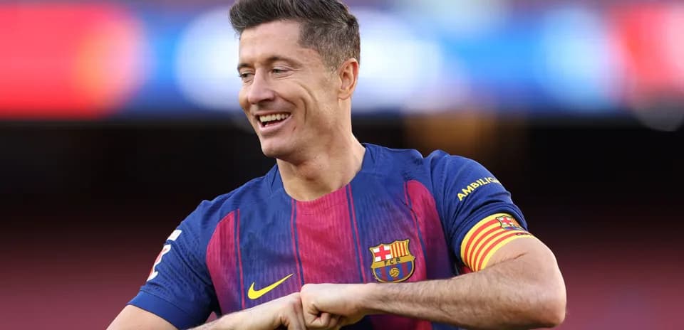 Player celebrating in Barcelona jersey on pitch