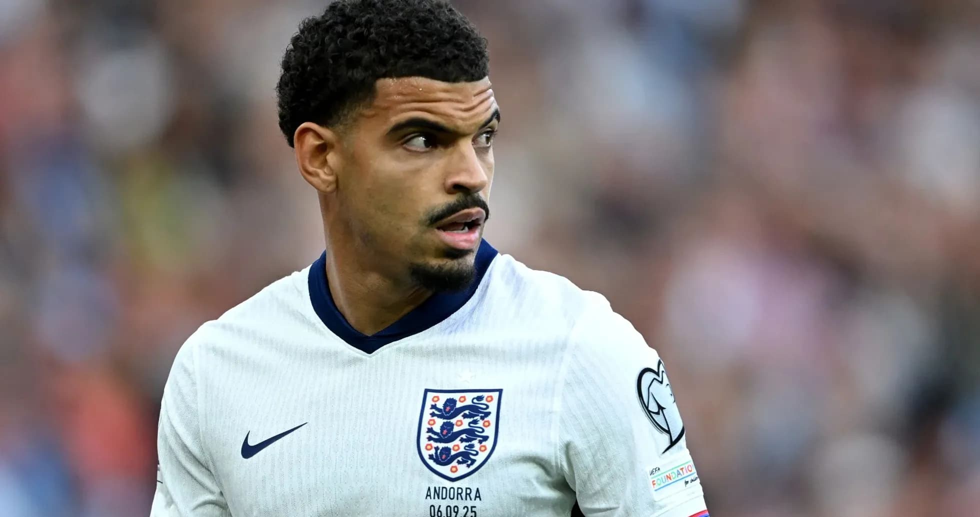 Player in England jersey during match action