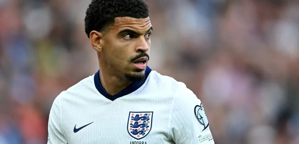 Player in England jersey during match action
