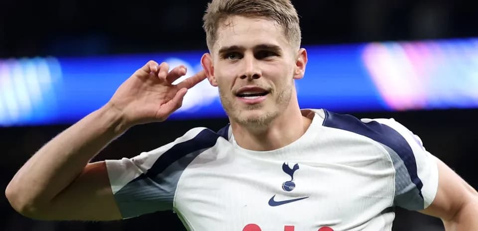 Player celebrating with hand to ear gesture