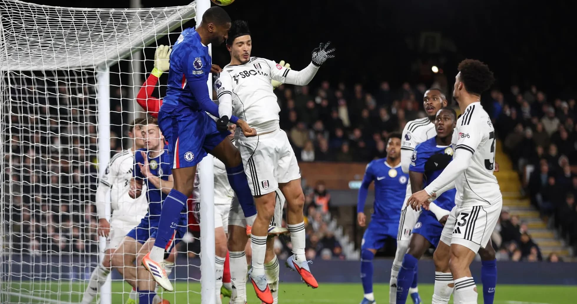 Chelsea player attempting to score during Fulham match