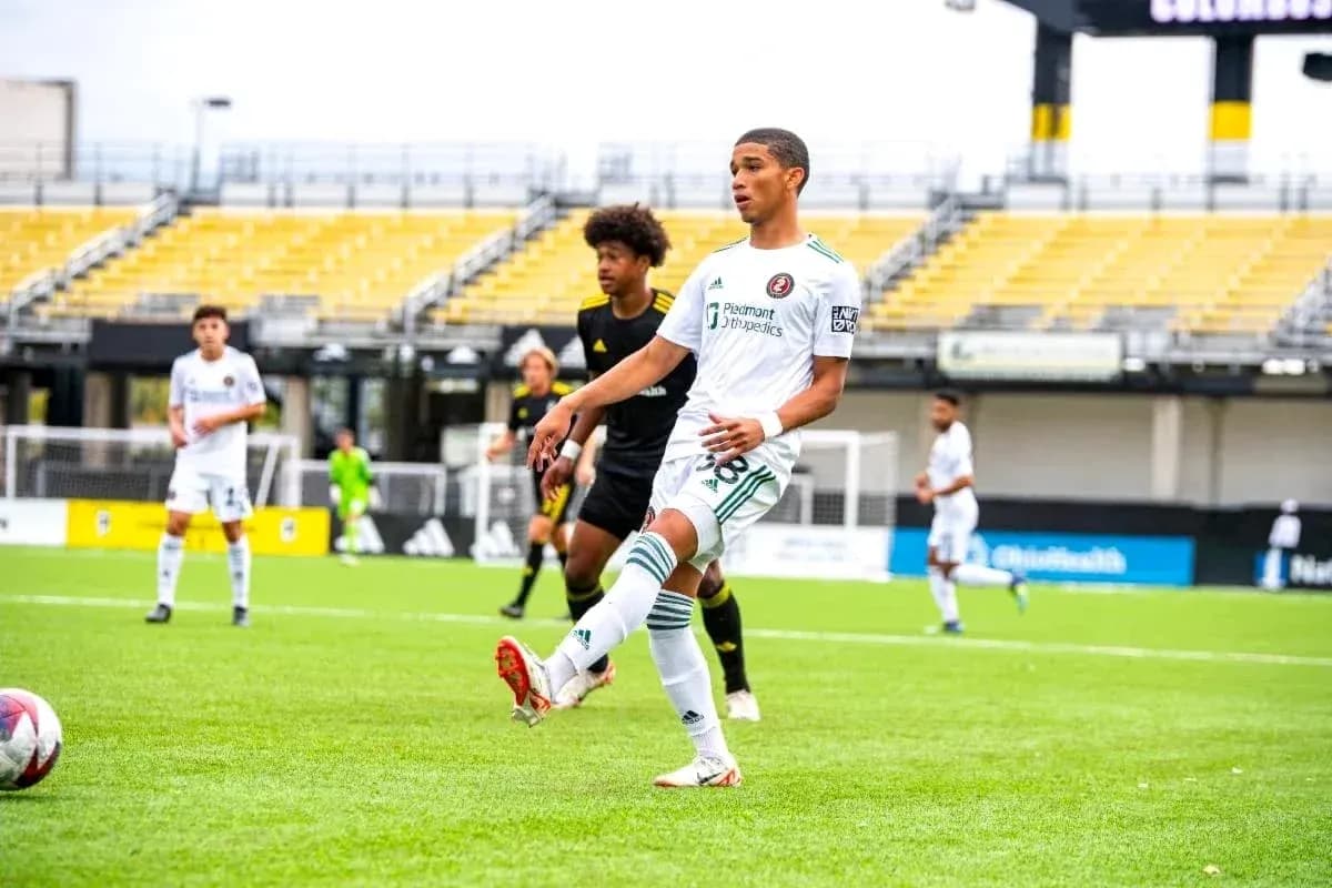 Player kicking ball during Columbus Crew II match