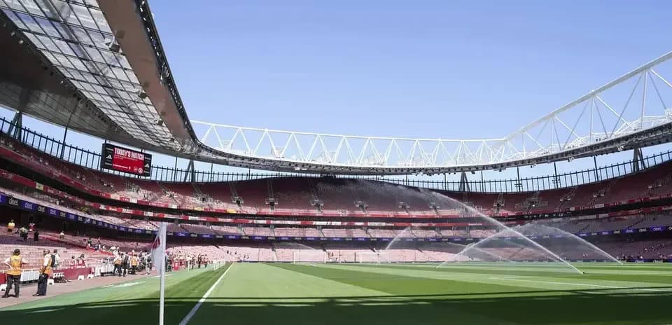 View of stadium with watering system in operation