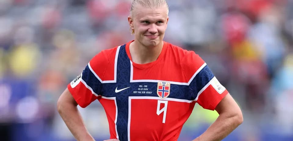 Norwegian player in red jersey during match