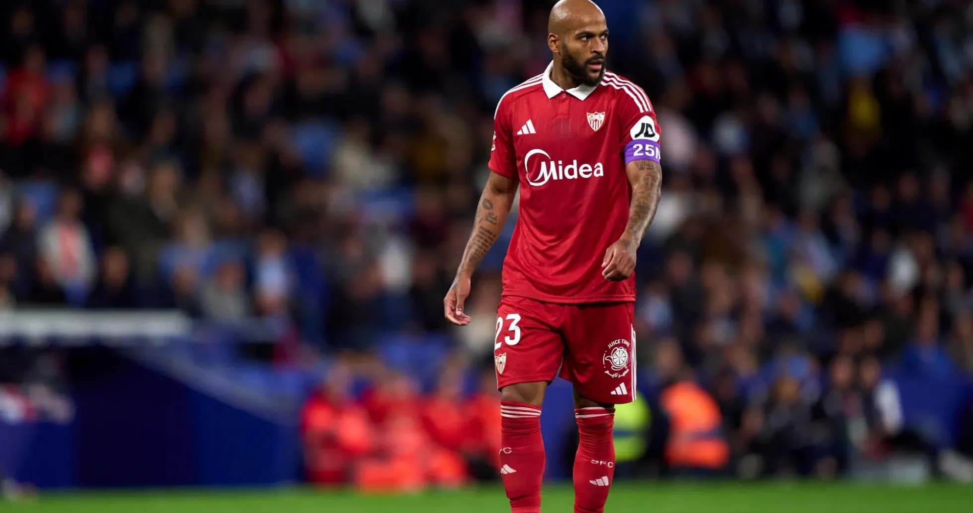 Sevilla player walking on the pitch