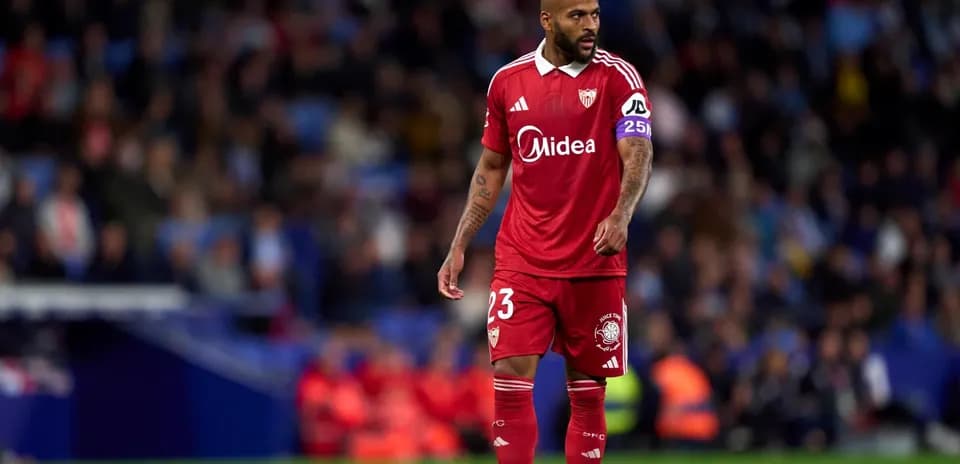Sevilla player walking on the pitch