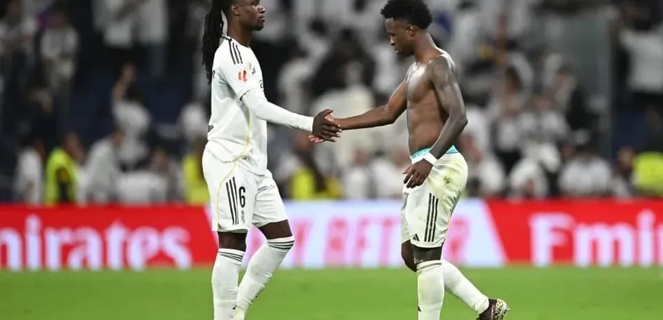 Two players shaking hands after a match