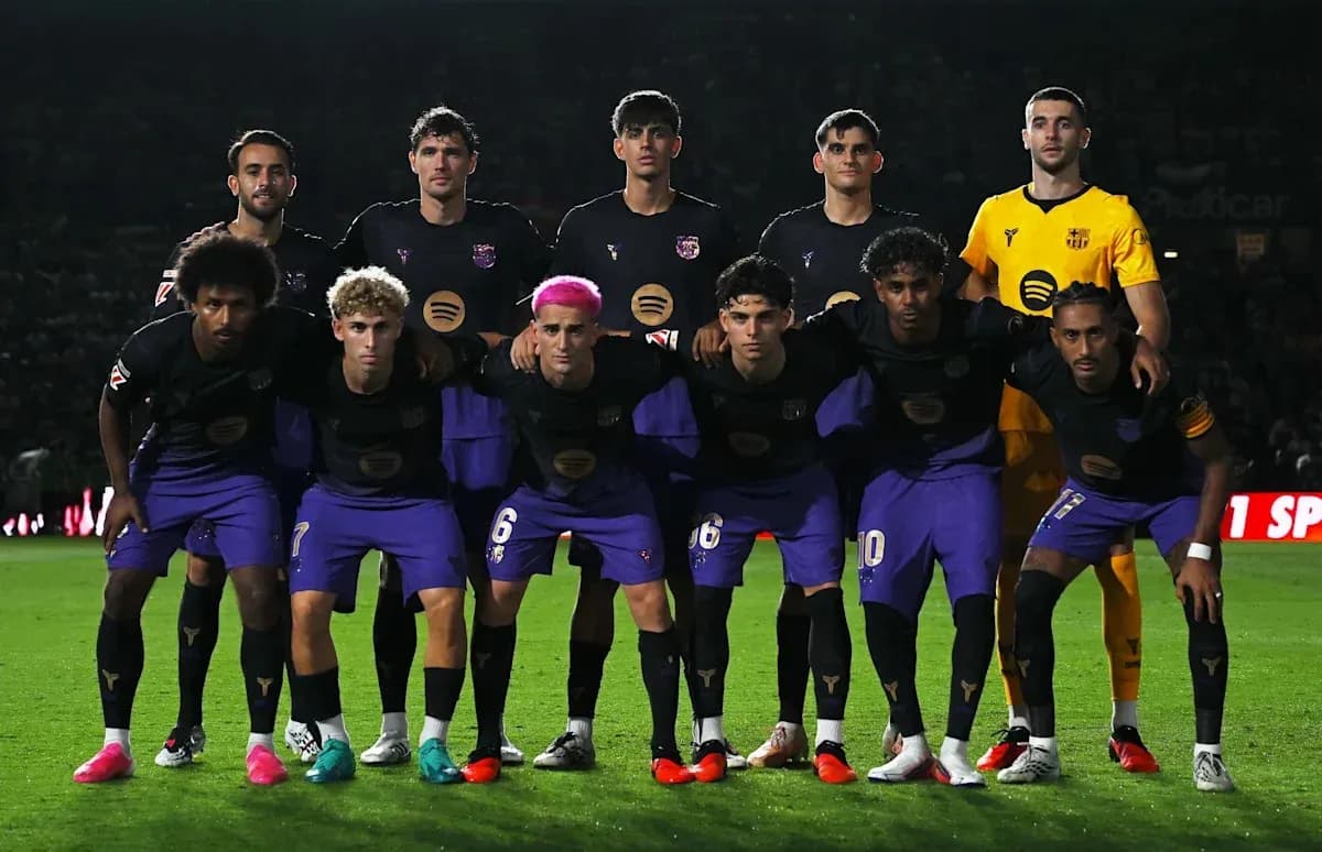 Football team posing for photo before match