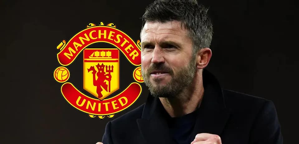 Man smiling with Manchester United logo in background