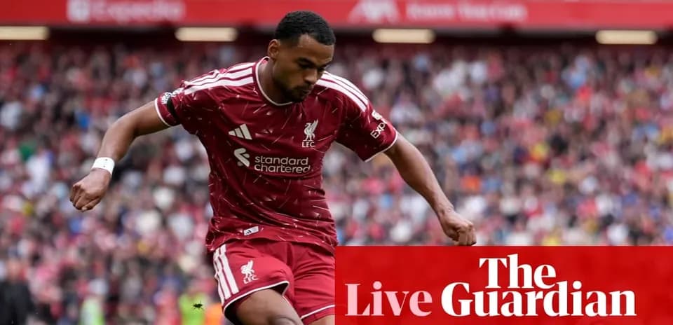 Liverpool player dribbling the ball during match
