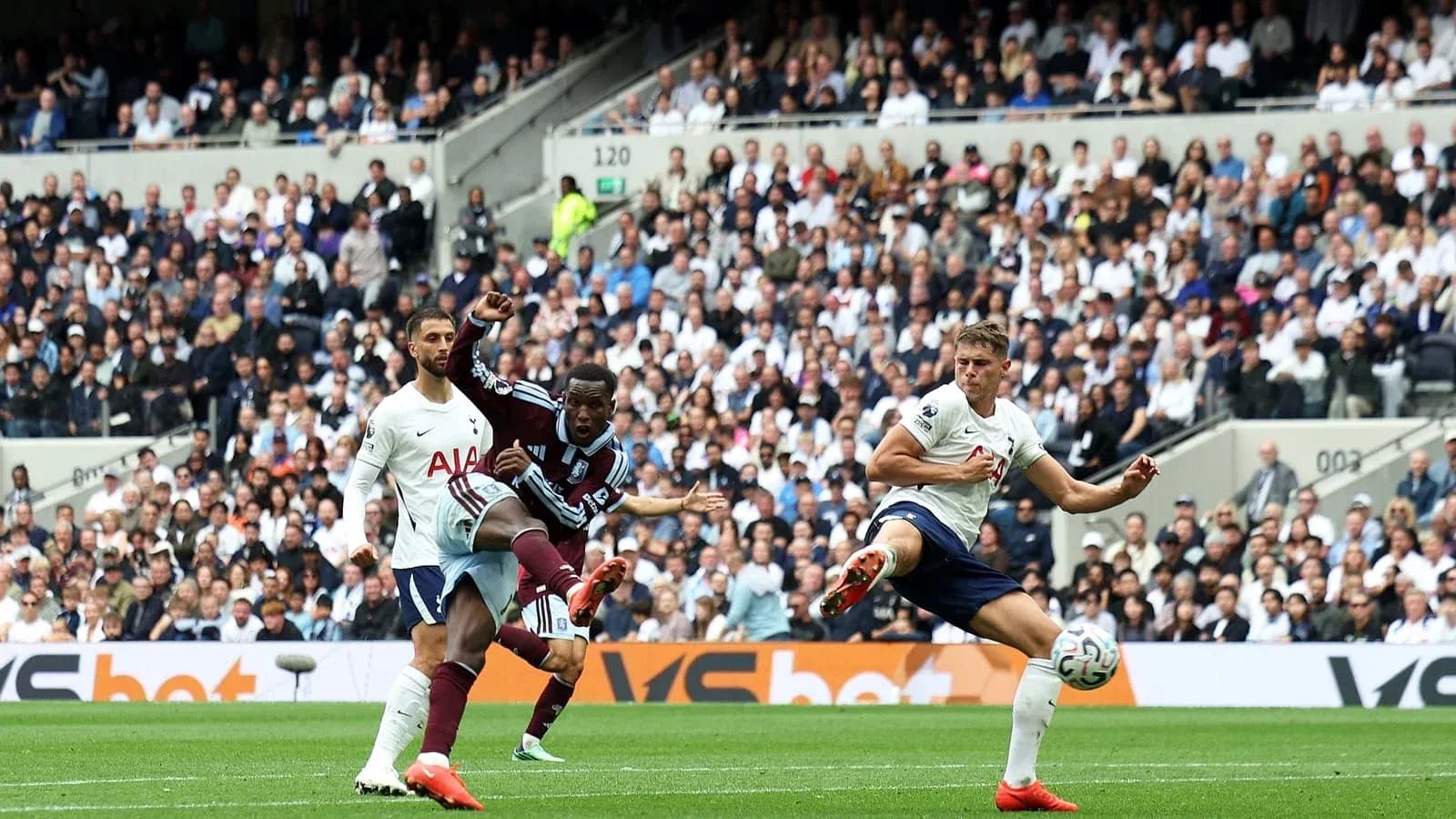 Player kicking the ball during a football match