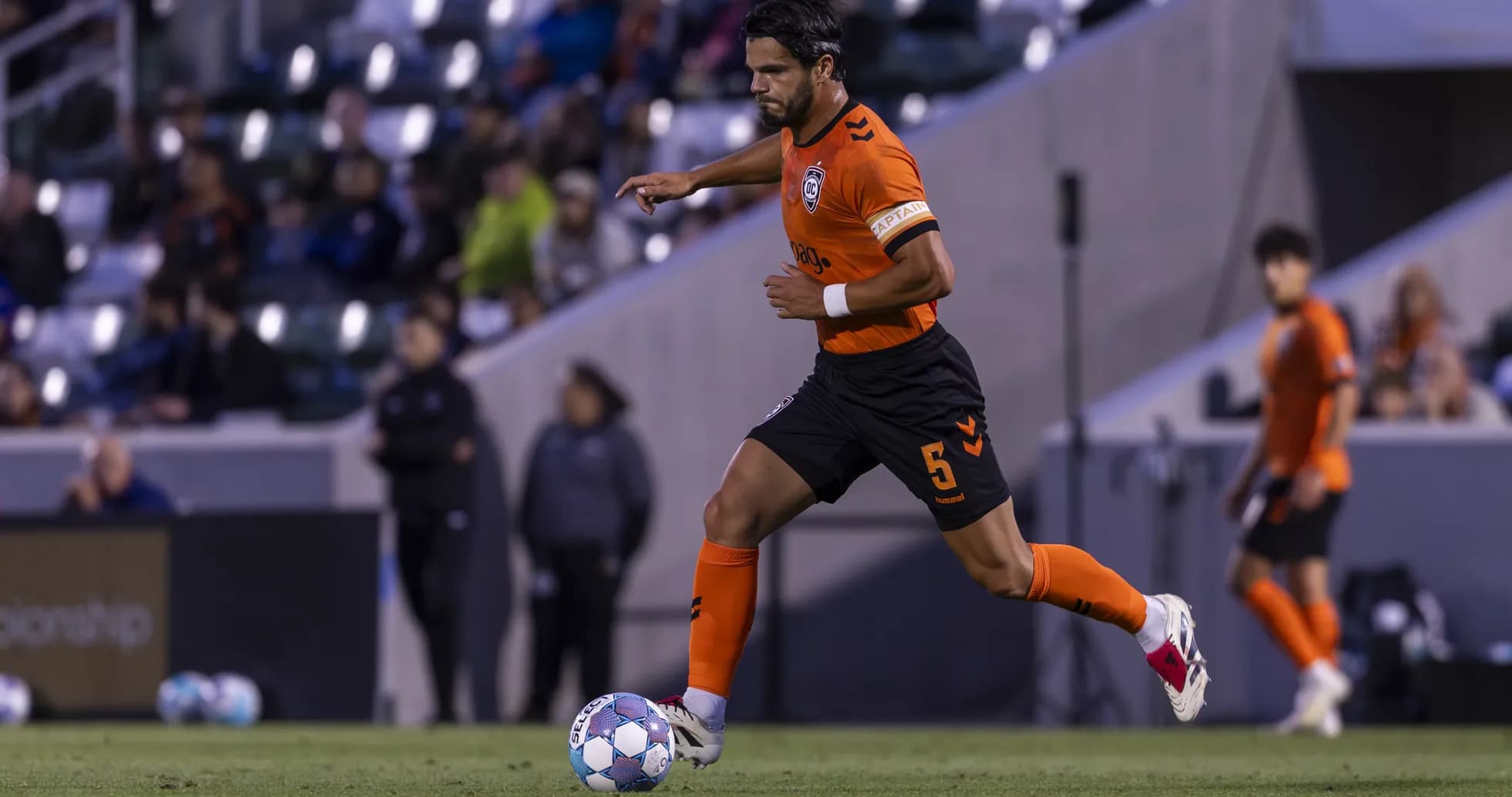 Player dribbling the ball during match