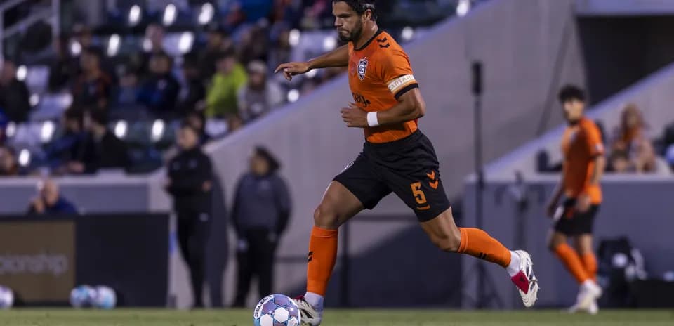 Player dribbling the ball during match
