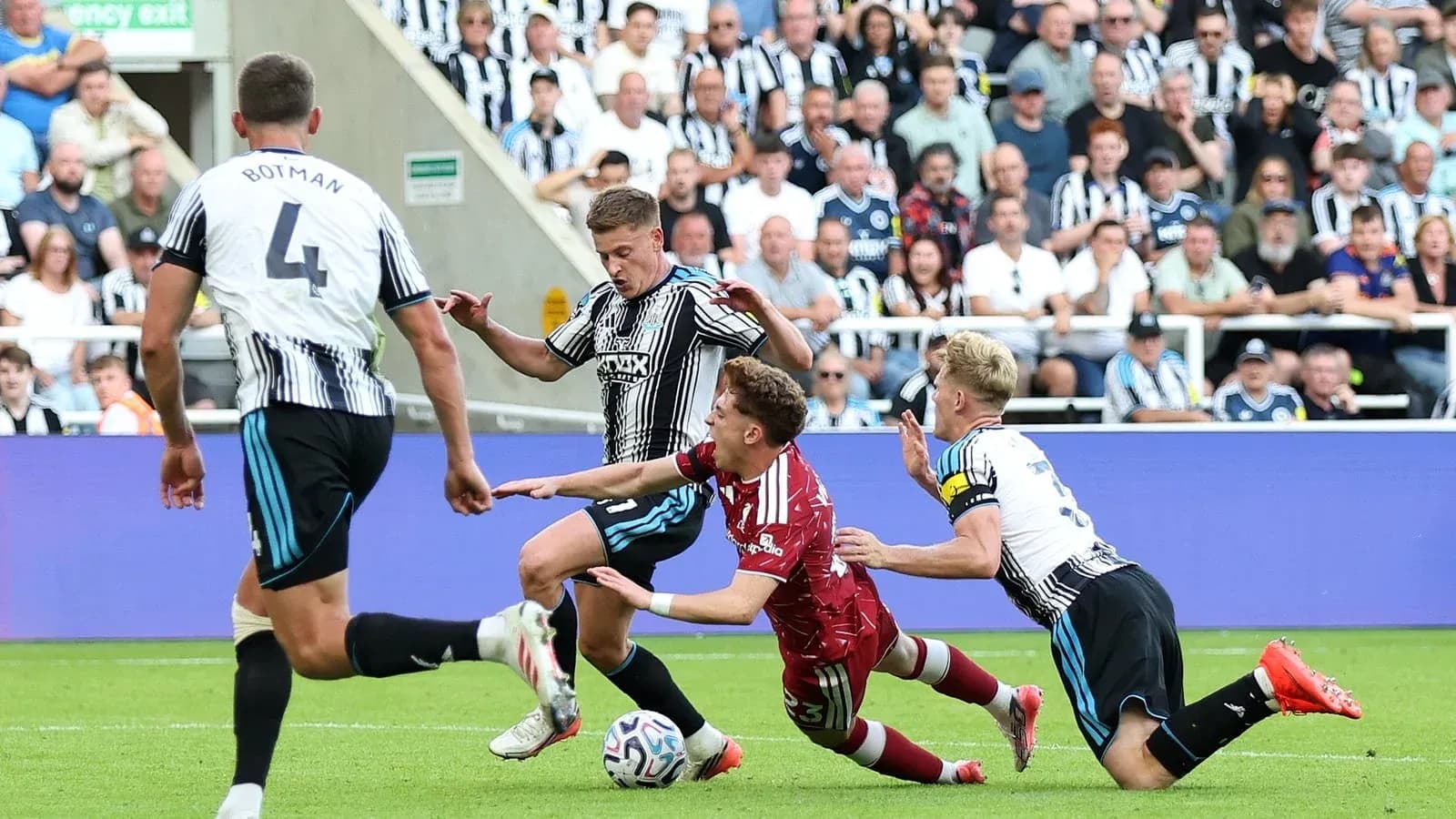 Players contesting for the ball during a match