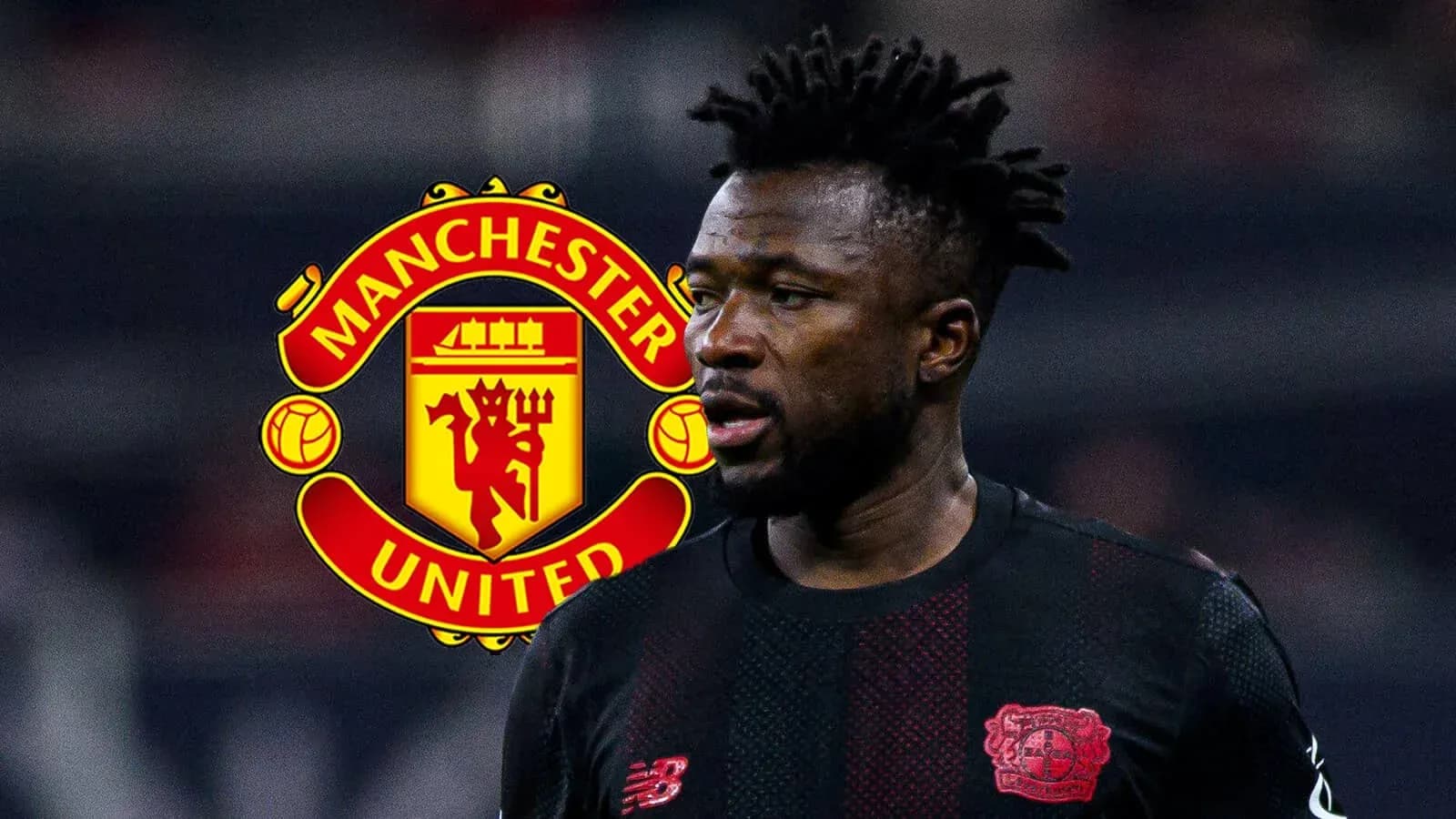 Player in black jersey with Manchester United logo behind