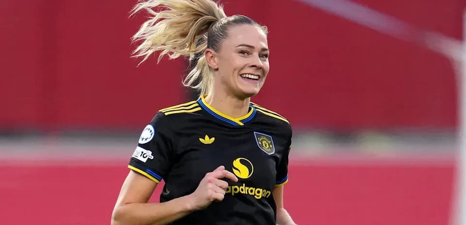 Female player celebrating during a soccer match