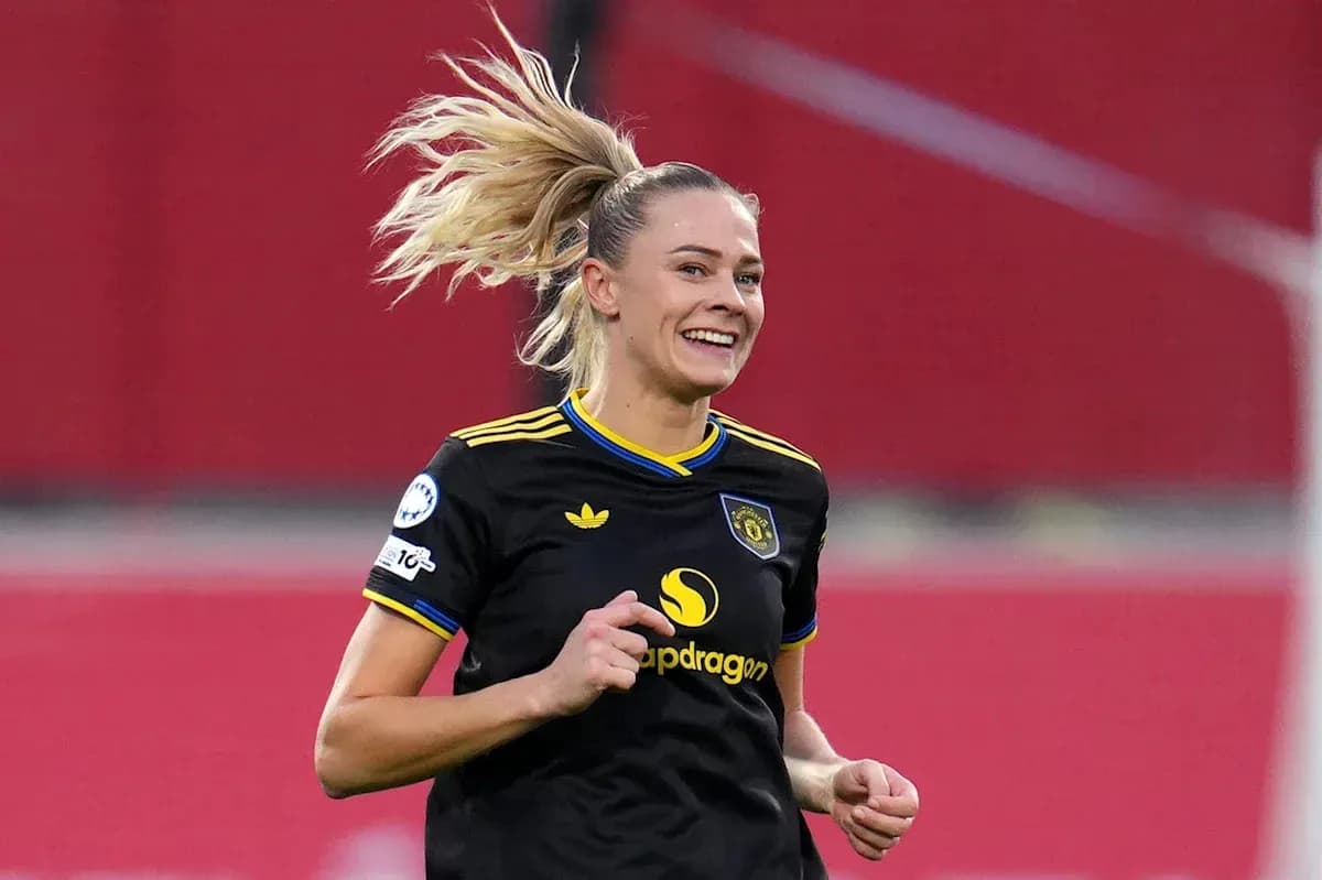 Female player celebrating during a soccer match