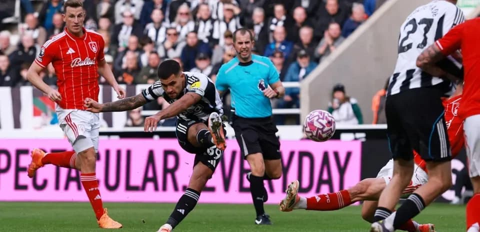 Newcastle player shooting during Nottingham Forest match