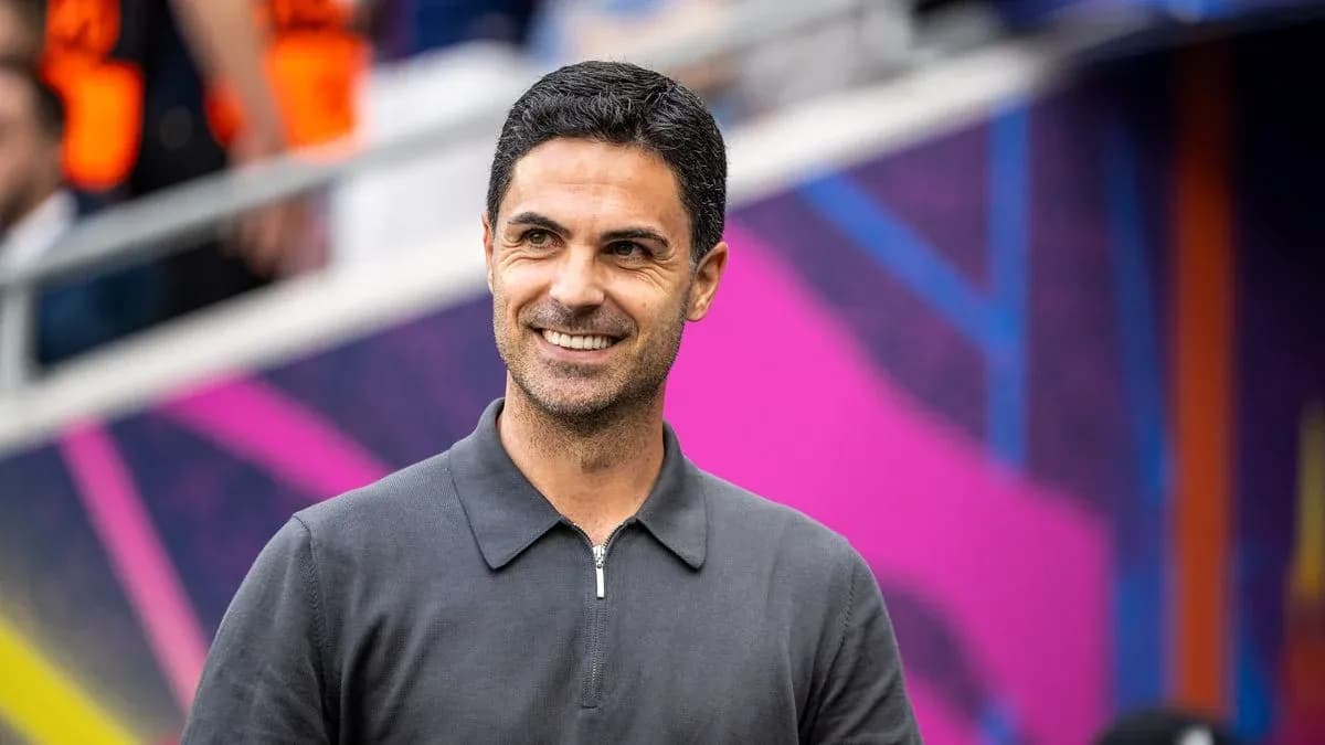 Manager smiling before the match in stadium