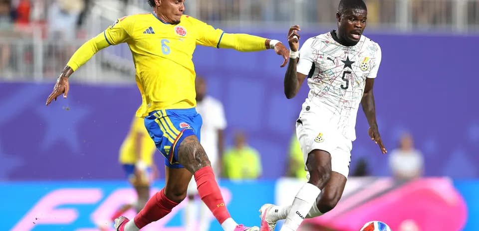Colombian player challenges Ghanaian opponent during match