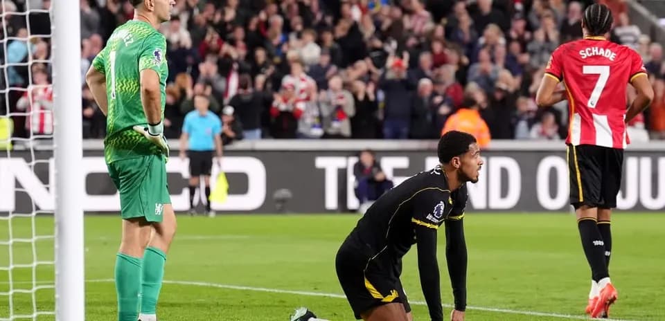 Goalkeeper and player reacting after a goal scored