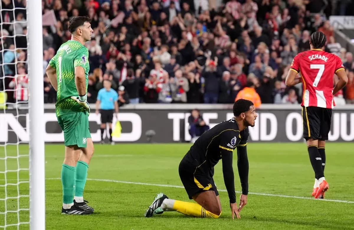 Goalkeeper and player reacting after a goal scored