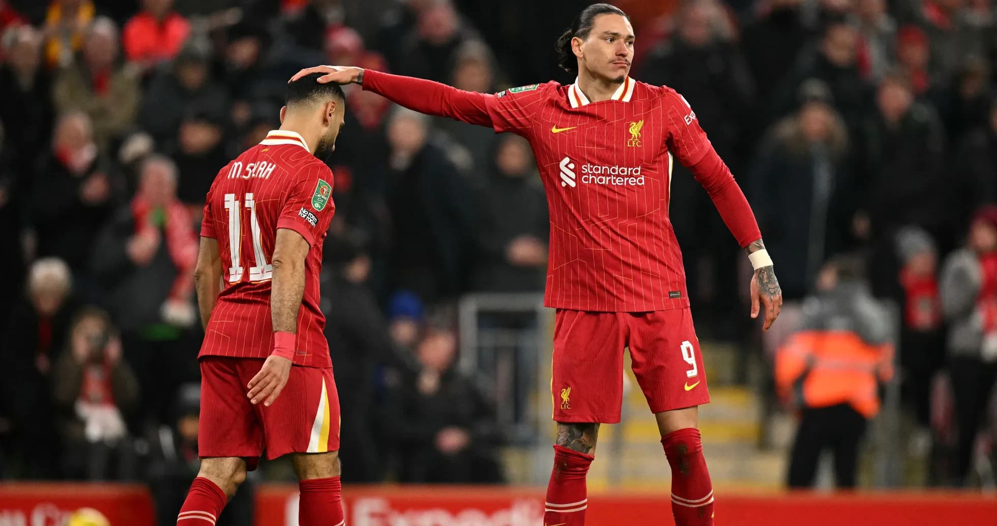 Liverpool players interacting during a match