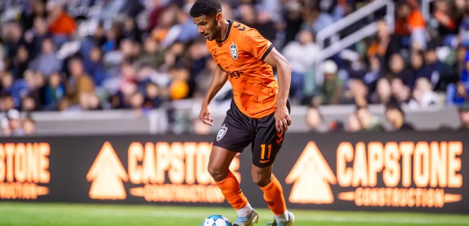Player dribbling during Las Vegas Lights match