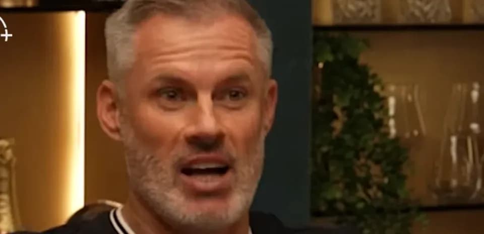 Man speaking animatedly during a discussion