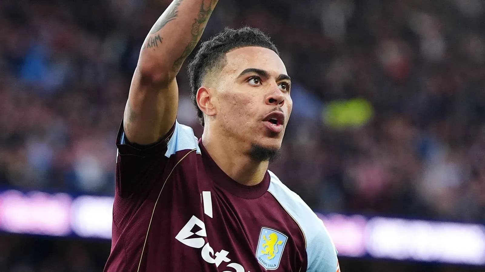 Player celebrating during a match for Aston Villa