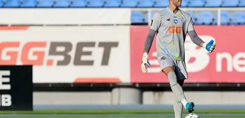 Goalkeeper warming up with a soccer ball