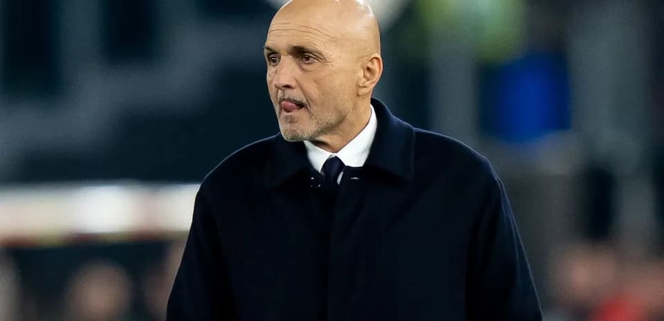 Manager walking on the sidelines during match