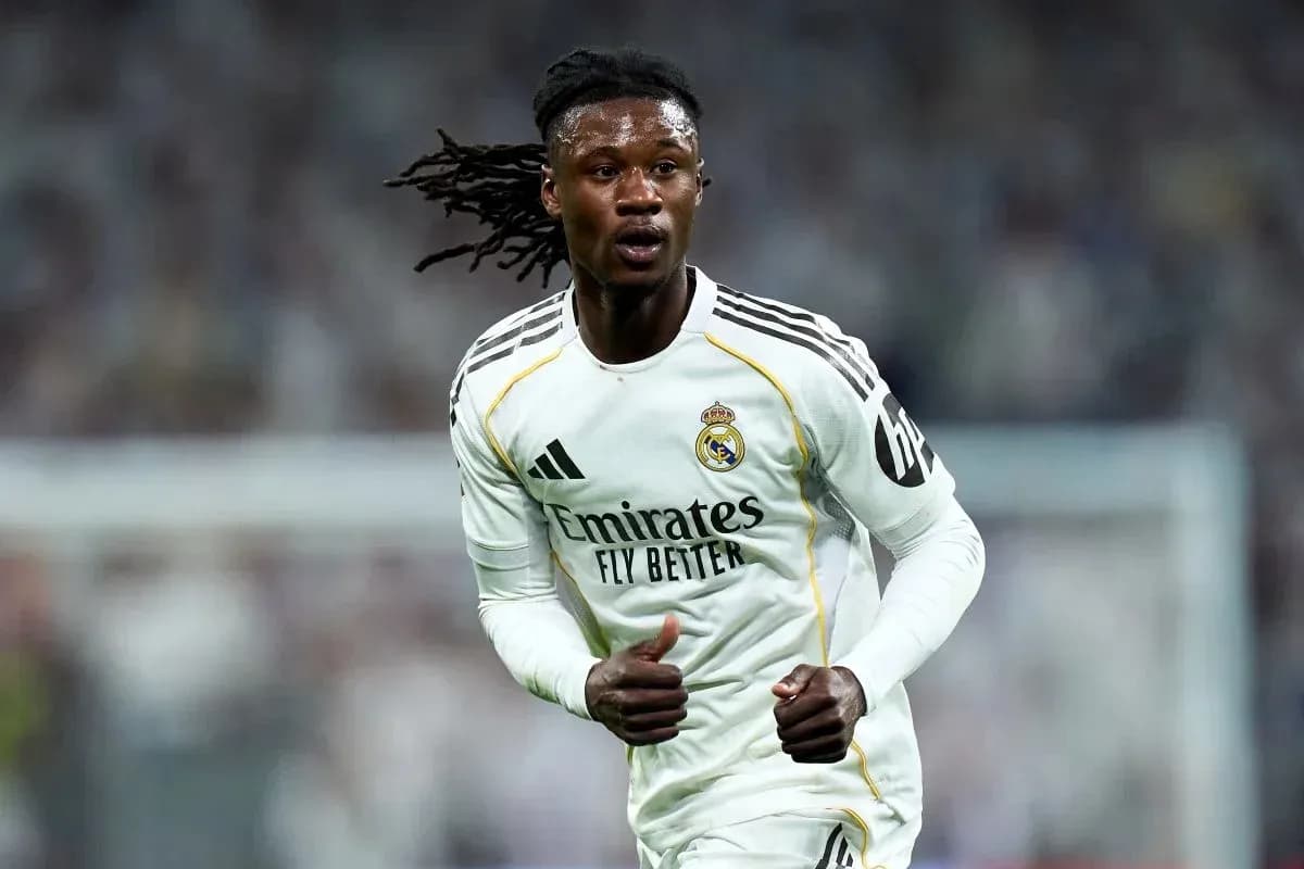 Player running on the pitch in Real Madrid kit