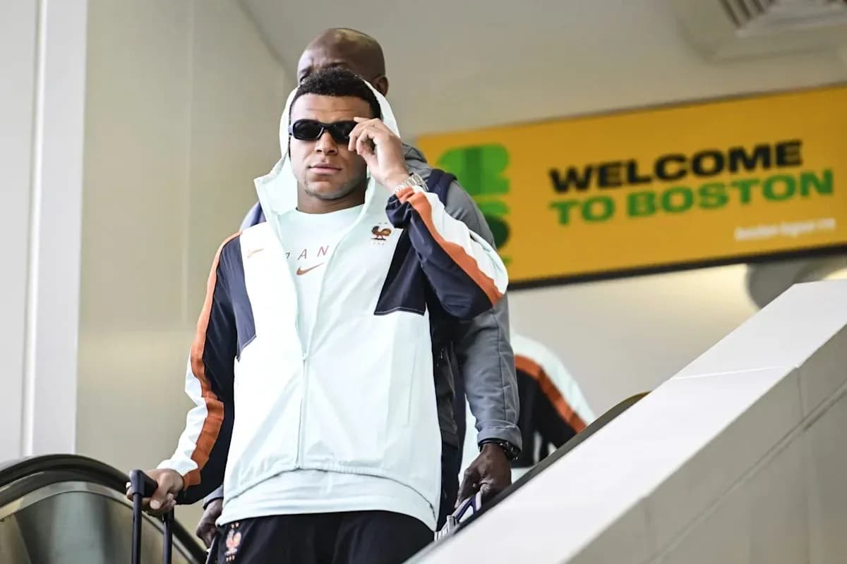 Player arriving at Boston airport wearing sunglasses