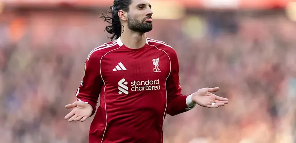 Player gesturing during a Liverpool match