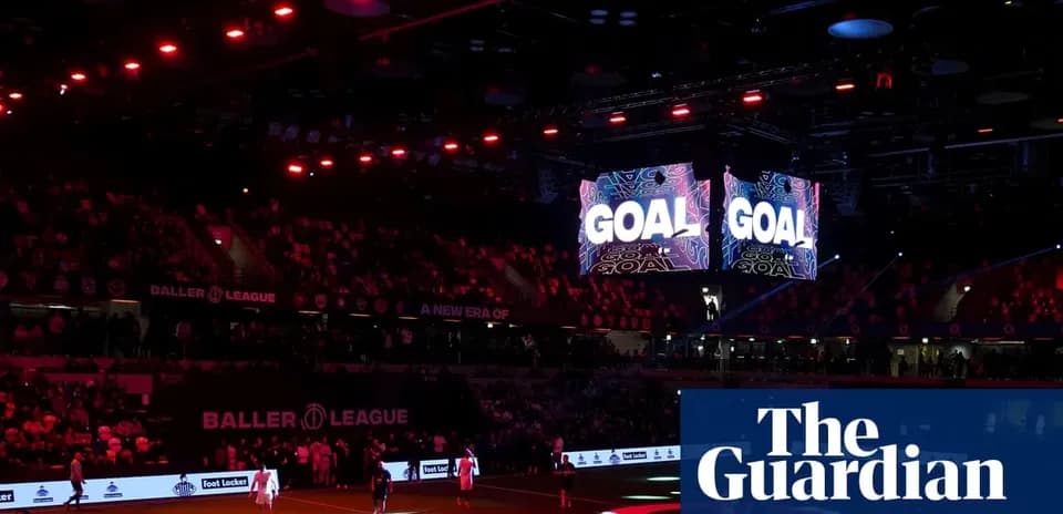 LED screens displaying 'GOAL' in arena