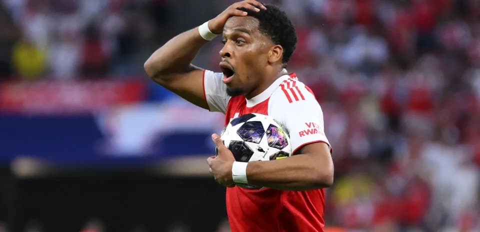 Player holding ball, showing surprise during match