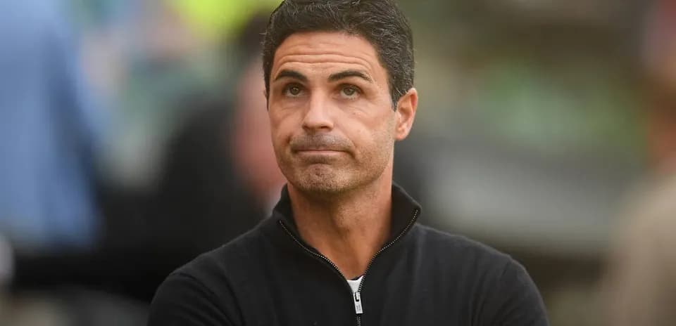 Manager observing match from the sidelines