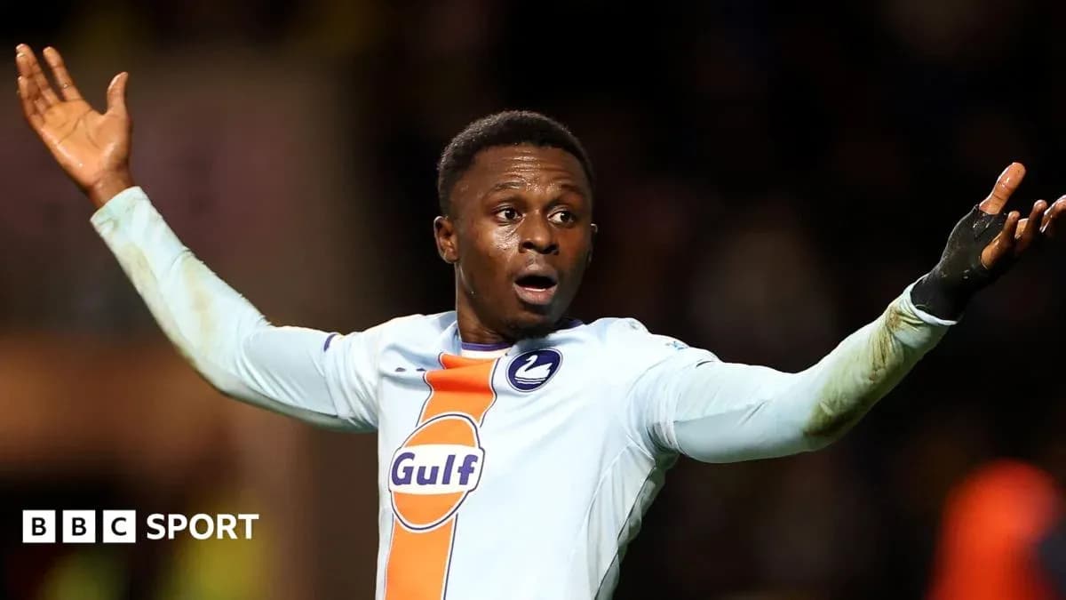 Player gesturing during a football match