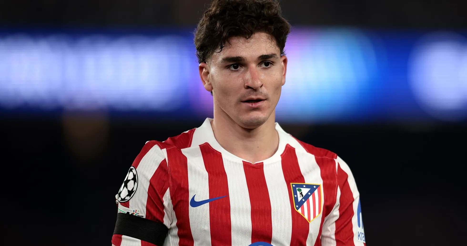 Atletico Madrid player during match with armband