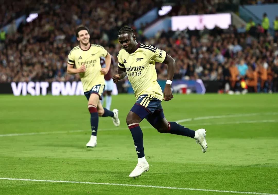 Arsenal player celebrating goal against Aston Villa