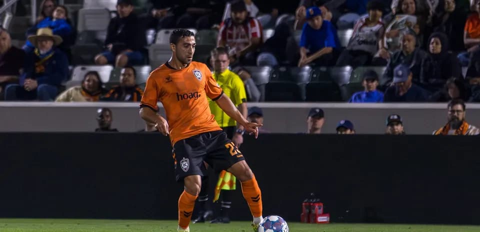 Player from Orange County SC in action