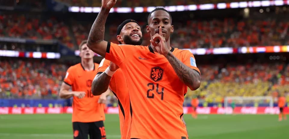 Players celebrating a goal during a match
