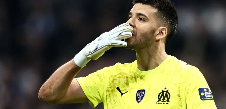 Goalkeeper celebrating with a kiss gesture